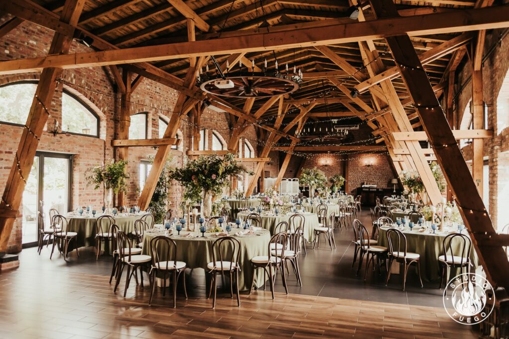 a wedding ceremony with a white and brown setting