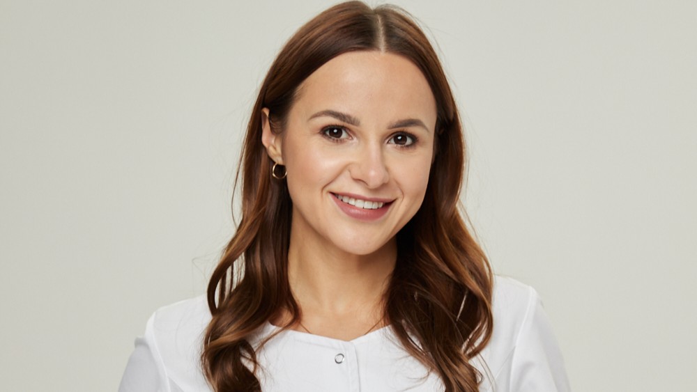 a woman smiling at camera